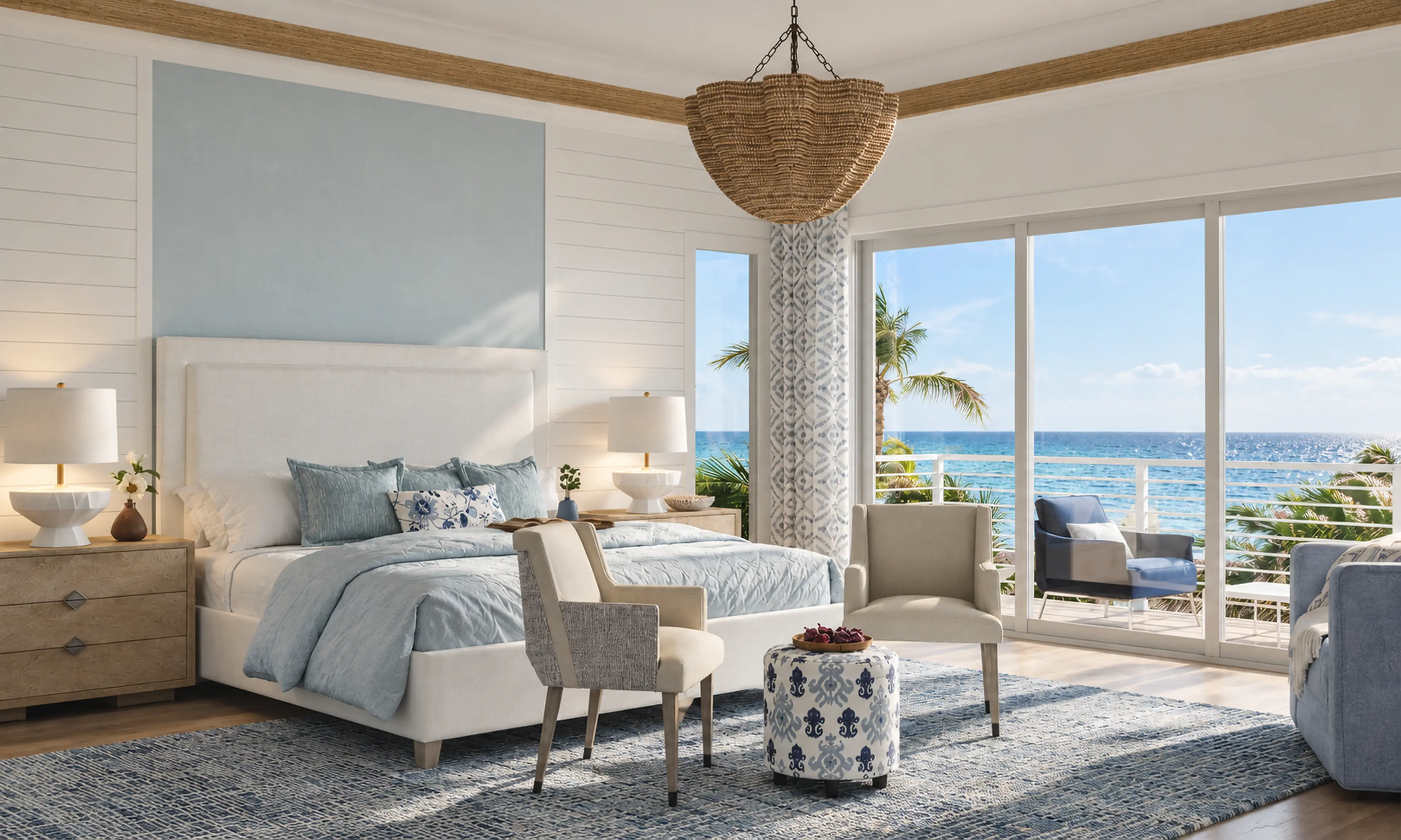 Oceanfront Highland Beach condo bedroom with blue textiles and a woven pendant.